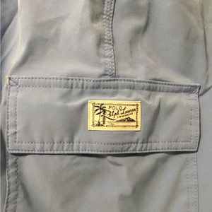 Ralph Lauren large men swim trunks baby blue packet on the side like new